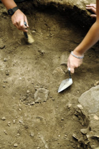 Mitchell Prehistoric Indian Village digging for artifacts