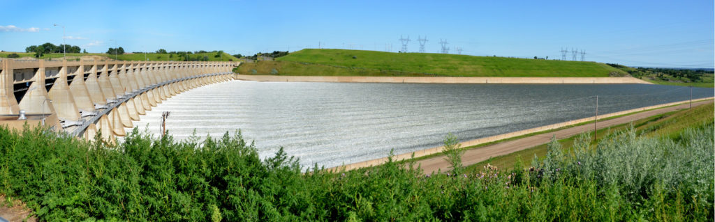 Panoramic photo of the Garrison Dam releasing water into the Missouri River in North Dakota