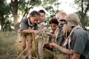 A group of children examining a fossil may be a common occurence while visiting the Dakotas top historical sites like Mitchell Prehistoric Indian Village.