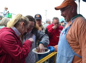 Long Beach Razor Clam Festival attendees receive free samples