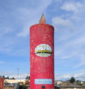 The 50-foot candle towers over the town of Scappoose